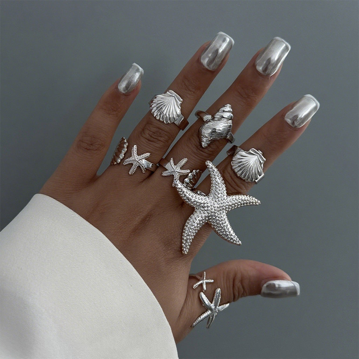 The ocean-style starfish fan shell ring has an irregular design and is a sunflower-shaped ring Hypersku