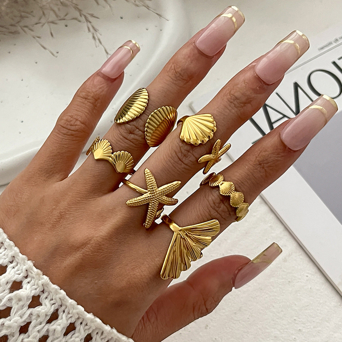 The ocean-style starfish fan shell ring has an irregular design and is a sunflower-shaped ring Hypersku