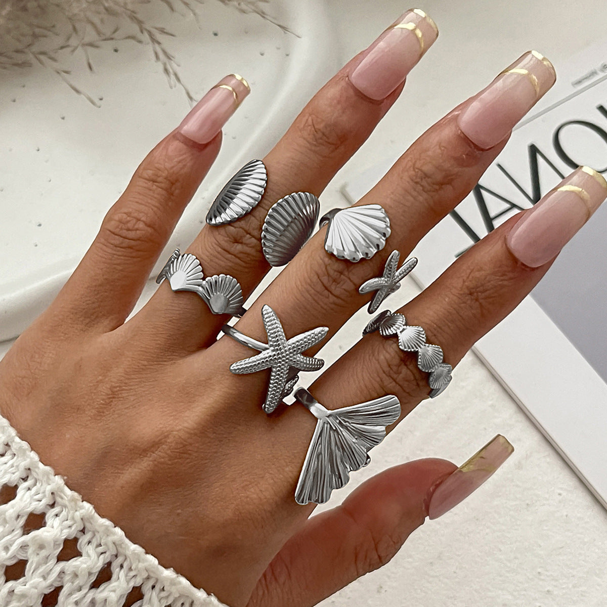 The ocean-style starfish fan shell ring has an irregular design and is a sunflower-shaped ring Hypersku