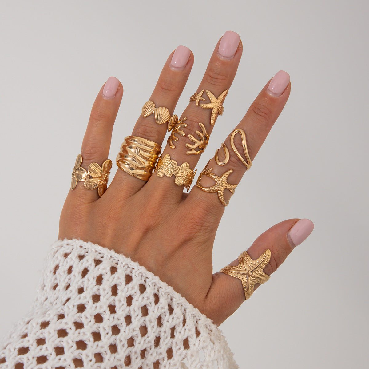The ocean-style starfish fan shell ring has an irregular design and is a sunflower-shaped ring Hypersku