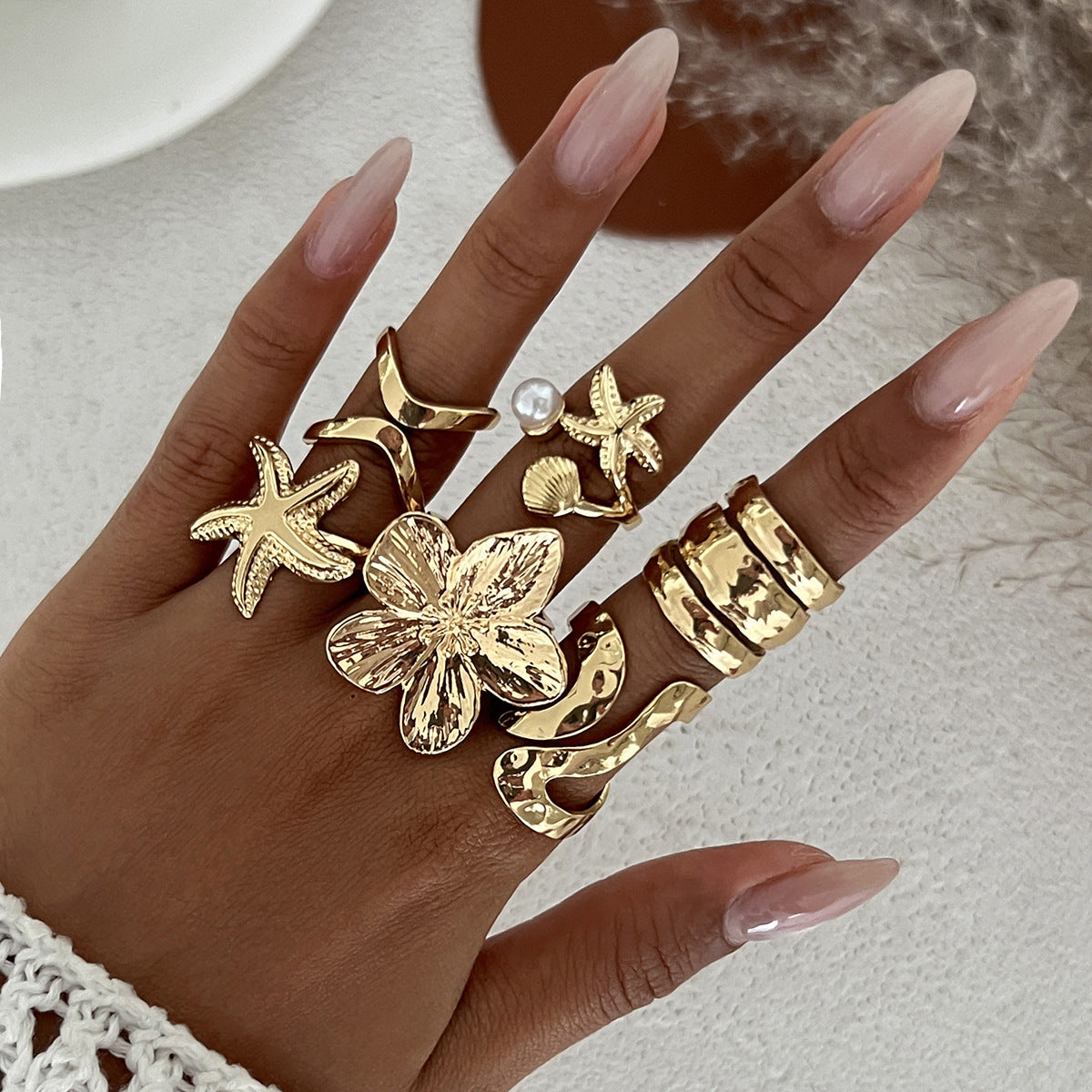 The ocean-style starfish fan shell ring has an irregular design and is a sunflower-shaped ring Hypersku