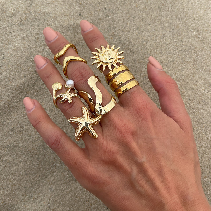 The ocean-style starfish fan shell ring has an irregular design and is a sunflower-shaped ring Hypersku