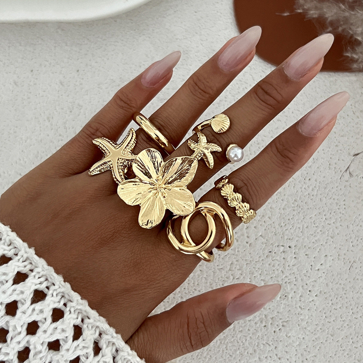 The ocean-style starfish fan shell ring has an irregular design and is a sunflower-shaped ring Hypersku