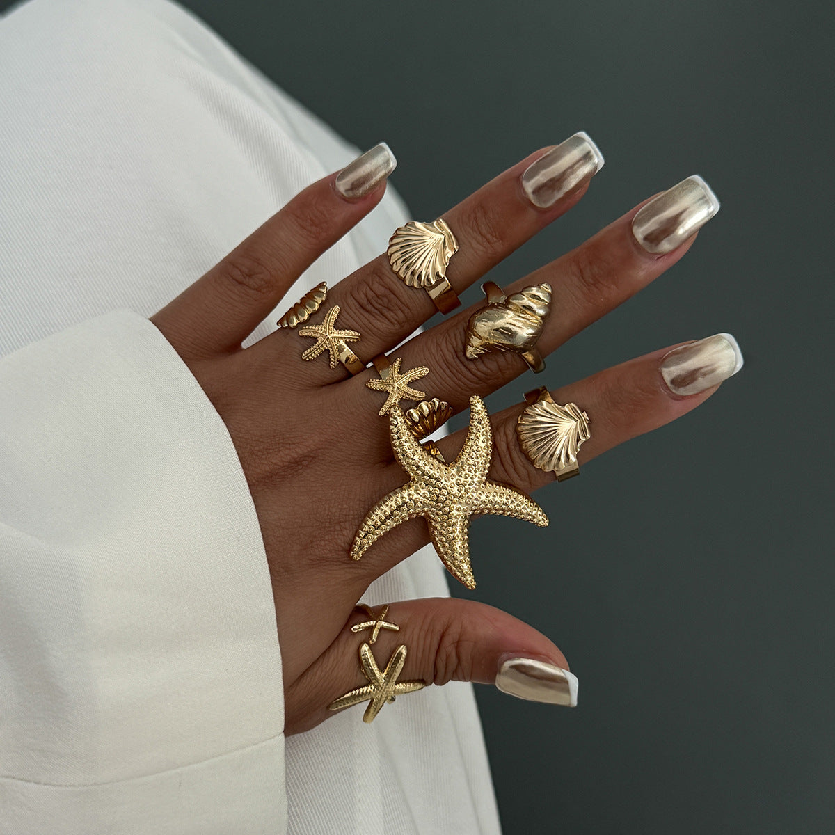 The ocean-style starfish fan shell ring has an irregular design and is a sunflower-shaped ring Hypersku